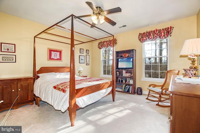 carpeted bedroom featuring ceiling fan