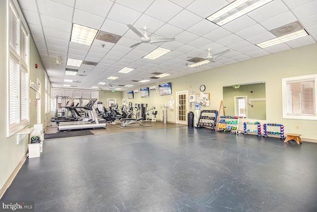 gym featuring a paneled ceiling