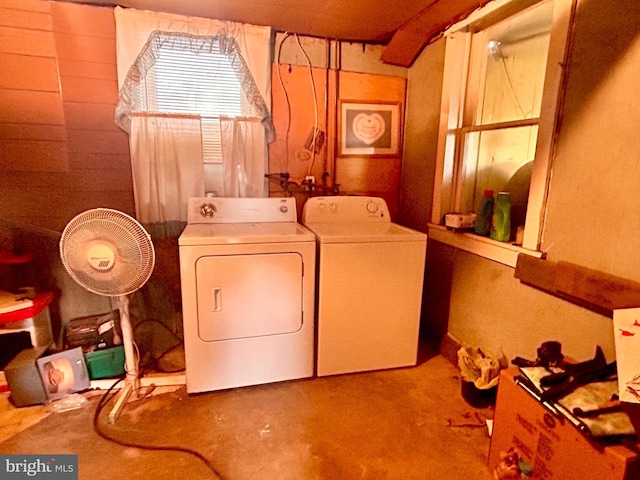 laundry room with independent washer and dryer