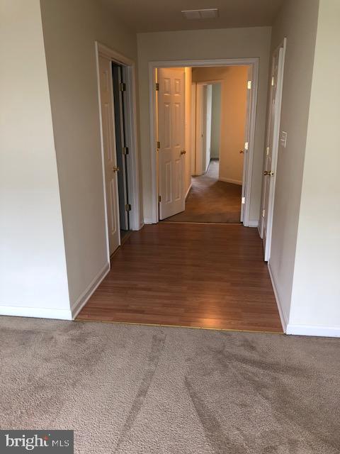 hall featuring hardwood / wood-style floors