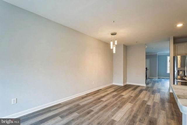 unfurnished room featuring dark hardwood / wood-style floors