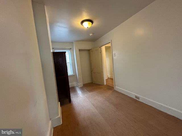 unfurnished bedroom with light hardwood / wood-style floors