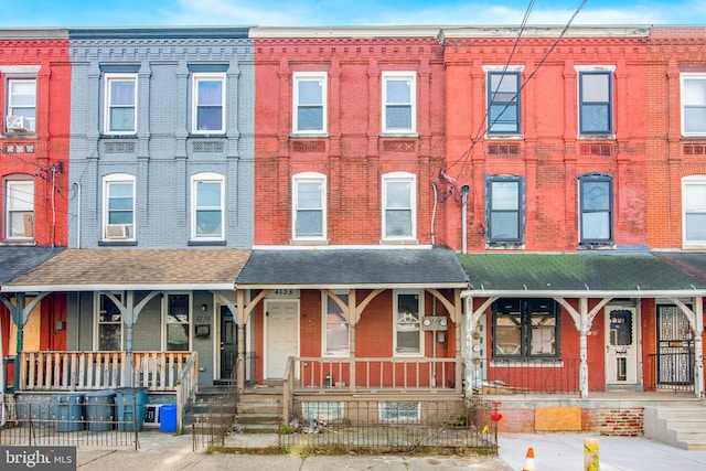 4138 Parrish St, Philadelphia, PA 19104 - view of property featuring a porch and brick siding