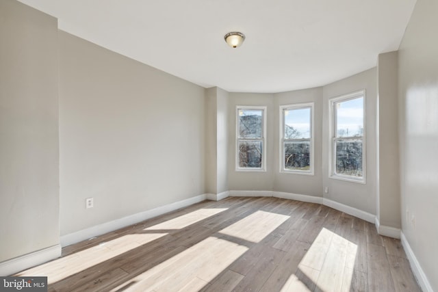 empty room featuring light hardwood / wood-style floors