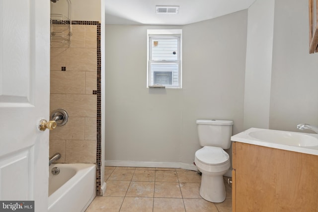 full bathroom with tile patterned floors, vanity, toilet, and tiled shower / bath