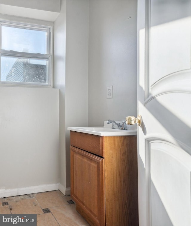 4138 Parrish St, Philadelphia, PA 19104 - bathroom with vanity and baseboards