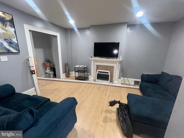 1723 N 53rd St, Philadelphia, PA 19131 - living room featuring wood finished floors, baseboards, recessed lighting, and heating unit