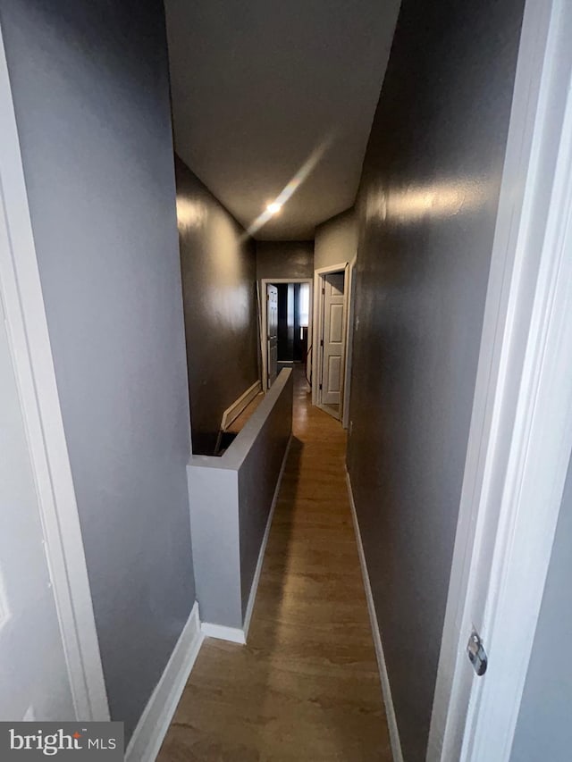 hall featuring dark hardwood / wood-style floors