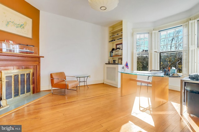 office space with light wood-type flooring