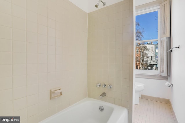 bathroom with tile patterned floors and toilet