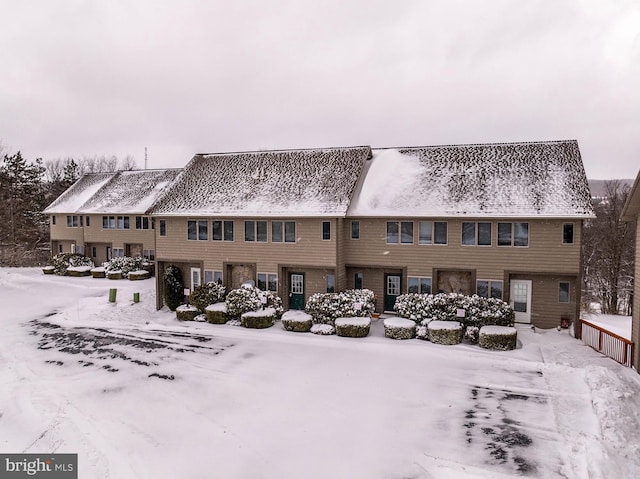 view of snow covered property