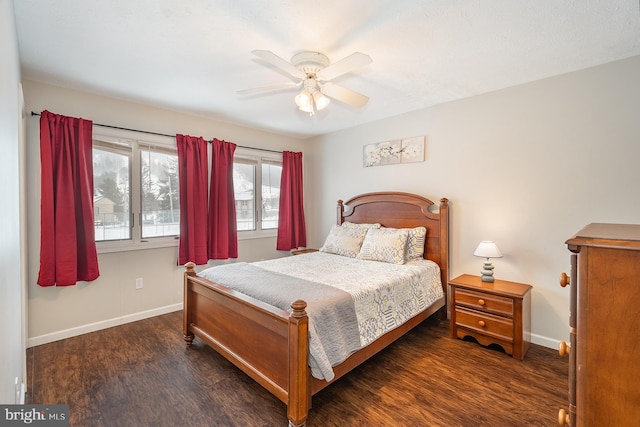 bedroom featuring ceiling fan and dark wood-type flooring