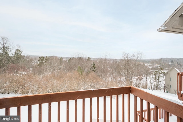 view of snow covered deck