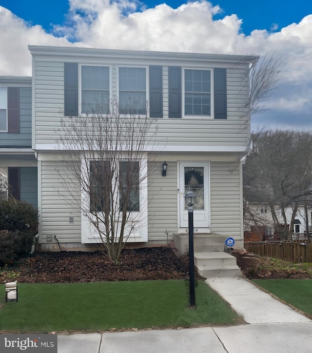 view of front of home with a front yard