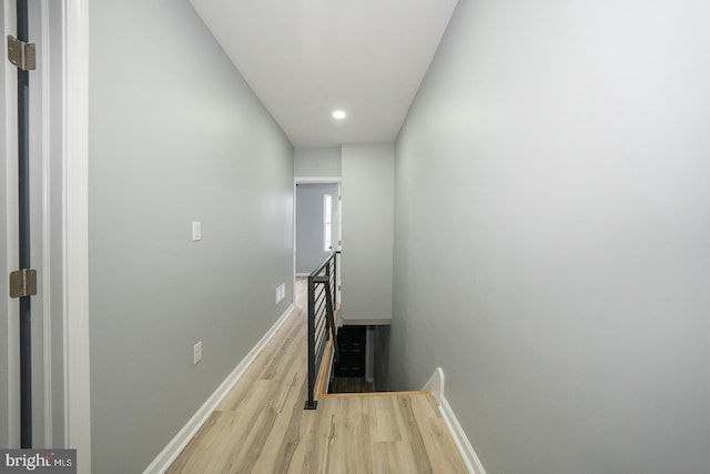 hallway with light wood-type flooring