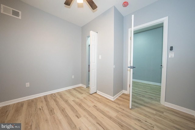 unfurnished bedroom featuring ceiling fan and light hardwood / wood-style floors