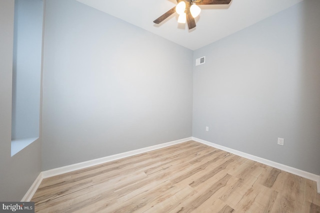 empty room featuring light hardwood / wood-style floors and ceiling fan