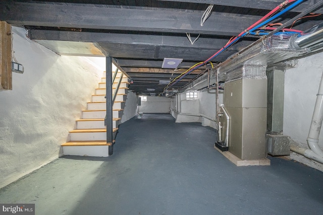 basement featuring heating unit