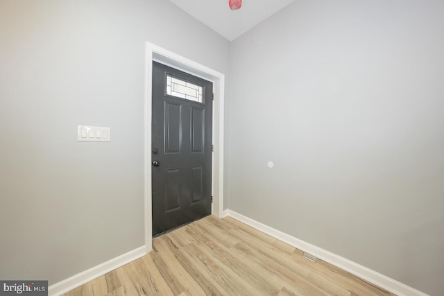 foyer with light hardwood / wood-style flooring