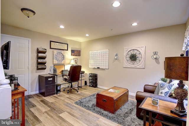 home office featuring light hardwood / wood-style floors