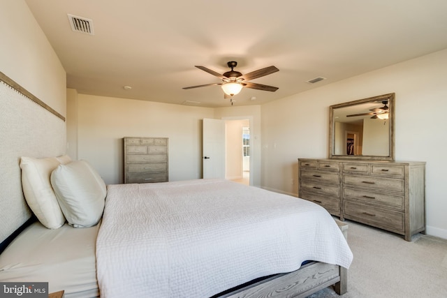 bedroom featuring ceiling fan and light colored carpet