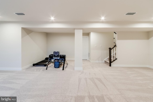 basement with light colored carpet