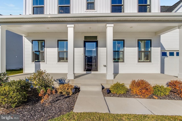 entrance to property with a porch