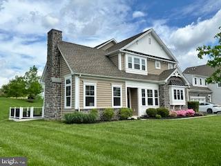 exterior space with a front yard