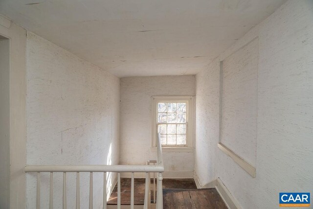 4679 Jeffersonton Rd, Jeffersonton, VA 22724 - stairs with wood finished floors, a textured wall, and baseboards