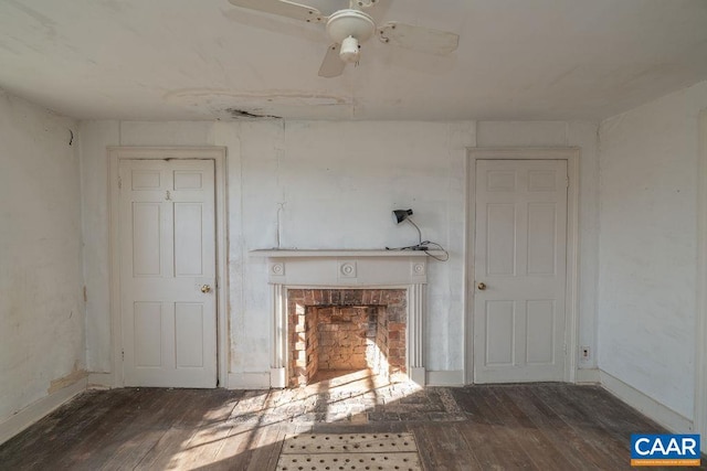4679 Jeffersonton Rd, Jeffersonton, VA 22724 - unfurnished living room with hardwood / wood-style floors, a ceiling fan, a brick fireplace, and baseboards