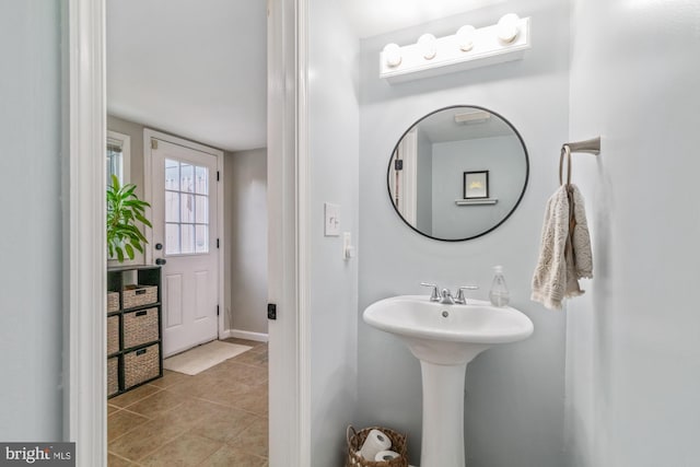 bathroom featuring tile patterned flooring