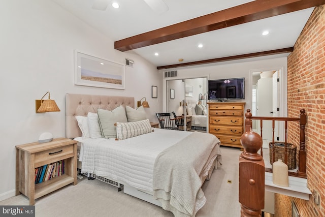 bedroom featuring light carpet, beamed ceiling, ceiling fan, and brick wall