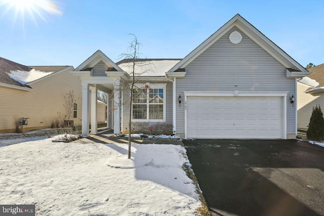 view of front of property featuring a garage