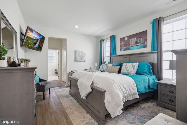 bedroom featuring dark wood-type flooring