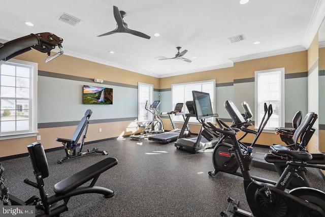 exercise room featuring crown molding and ceiling fan