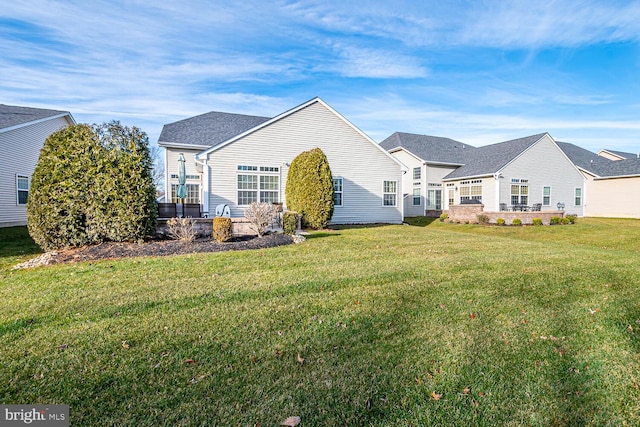 view of front of house with a front lawn