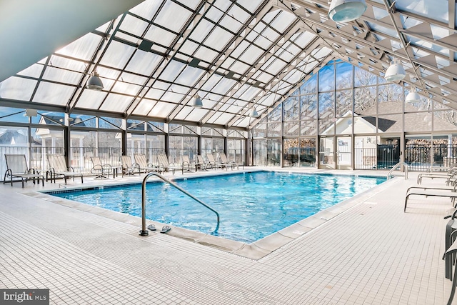 view of pool featuring a lanai and a patio area