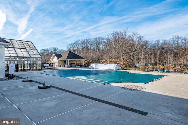 view of swimming pool featuring a patio