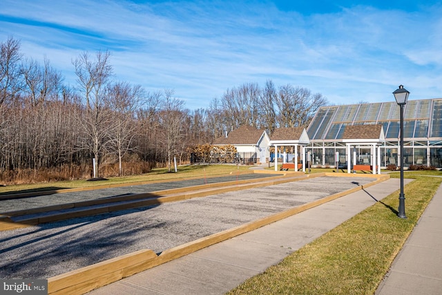 view of home's community featuring a yard