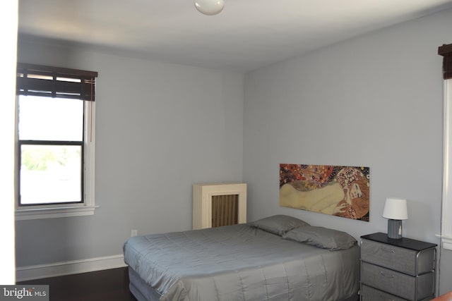 bedroom featuring multiple windows