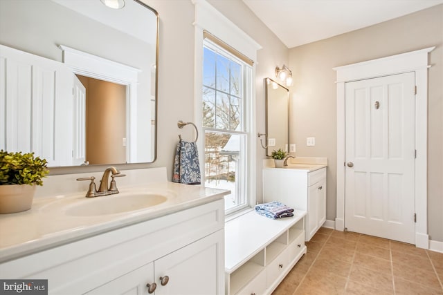 bathroom featuring vanity and a healthy amount of sunlight