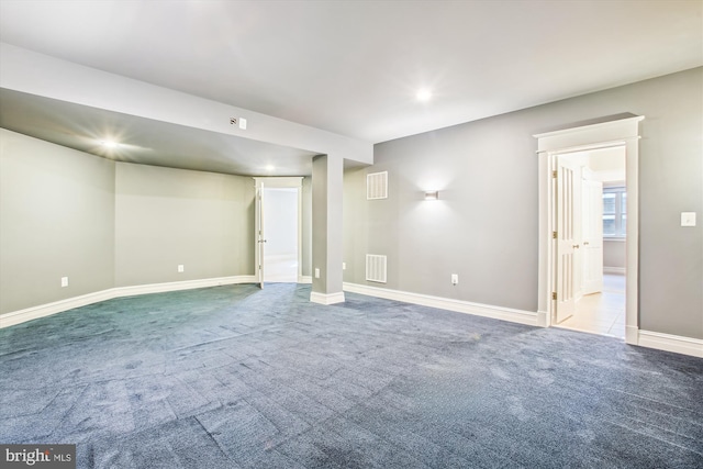 basement with light colored carpet