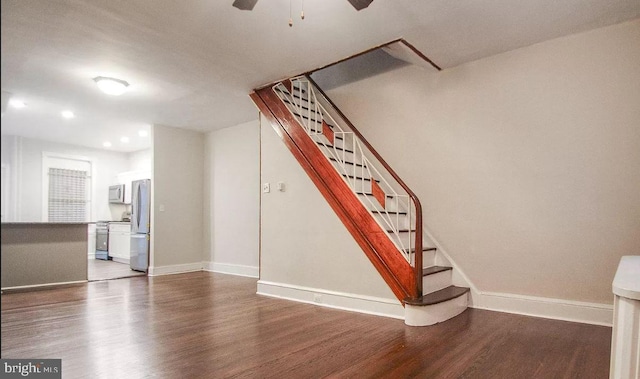 interior space featuring dark hardwood / wood-style floors and ceiling fan