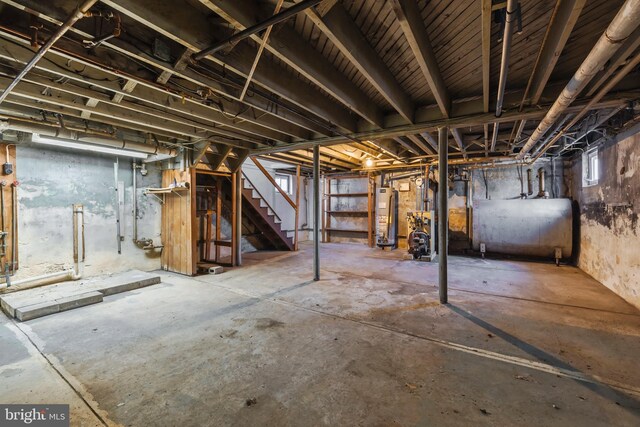 basement featuring water heater