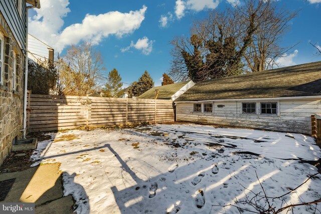 view of snow covered patio