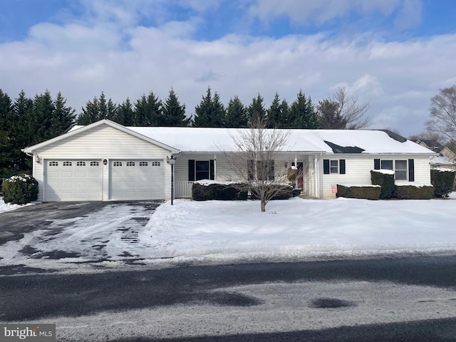 single story home featuring a garage