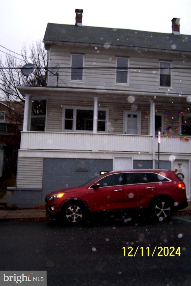 view of front of property with a garage