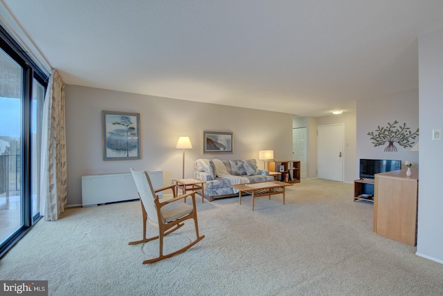 living room with light colored carpet and a wealth of natural light