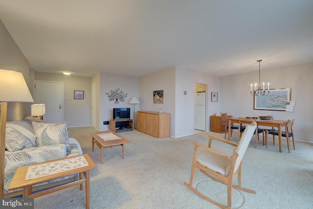 carpeted living room with a notable chandelier