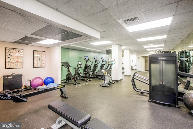 gym featuring a drop ceiling